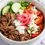 Colorful meal prep bowls filled with healthy ingredients for lunch and dinner.